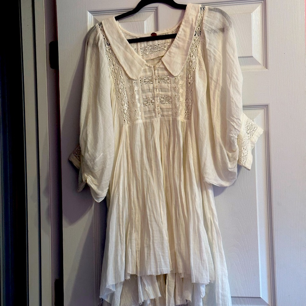 White Free People tunic never worn.